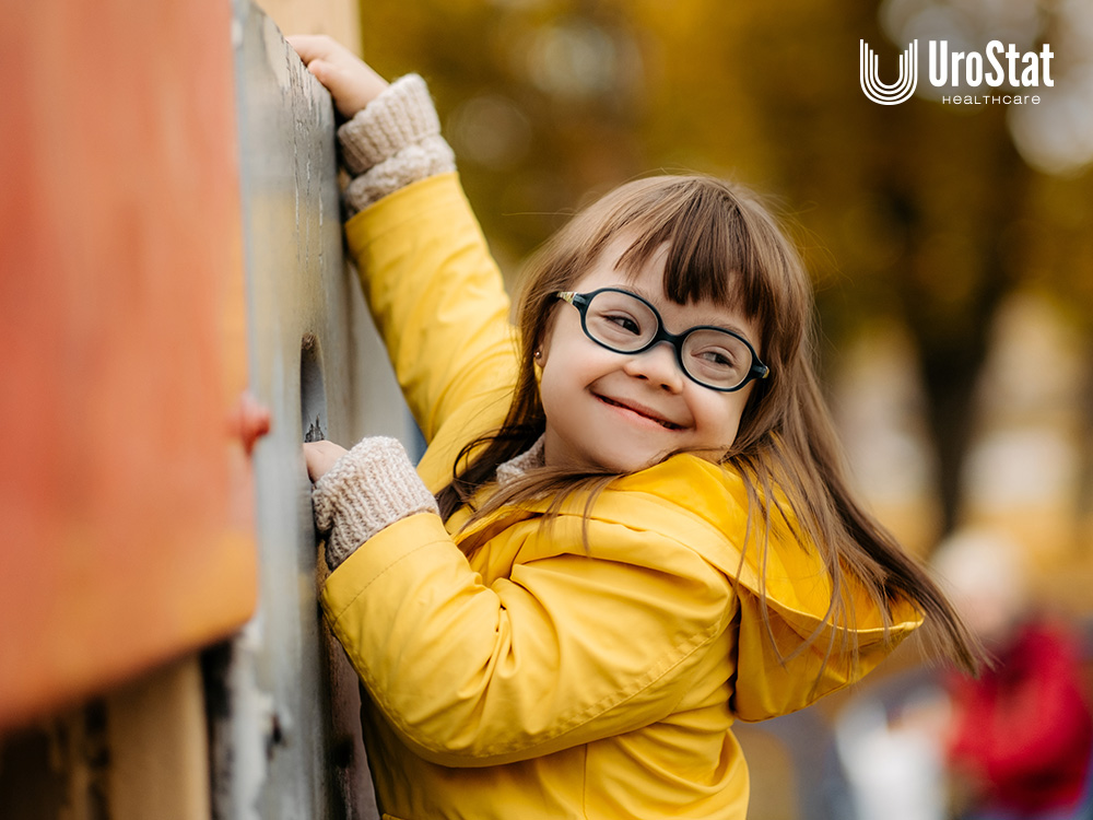 Child with special needs climbing the playground at school in a yellow jacket