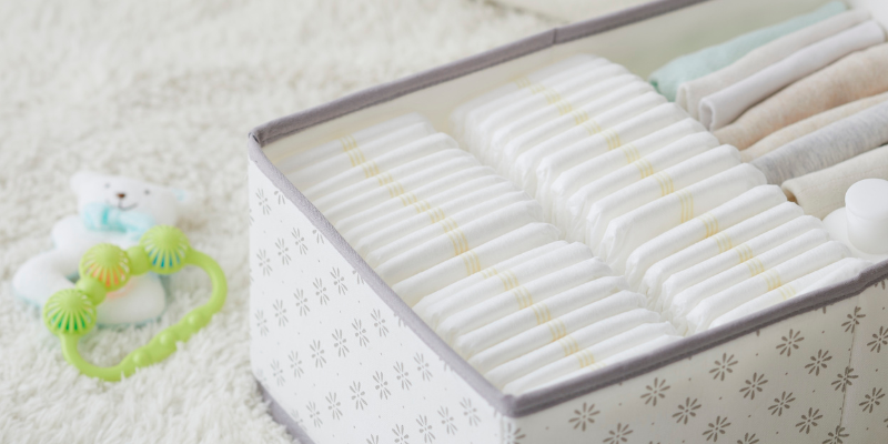 Stack of diapers in fabric organizer tote